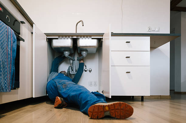 Professional Drain Cleaning technician working in Elmont, NY